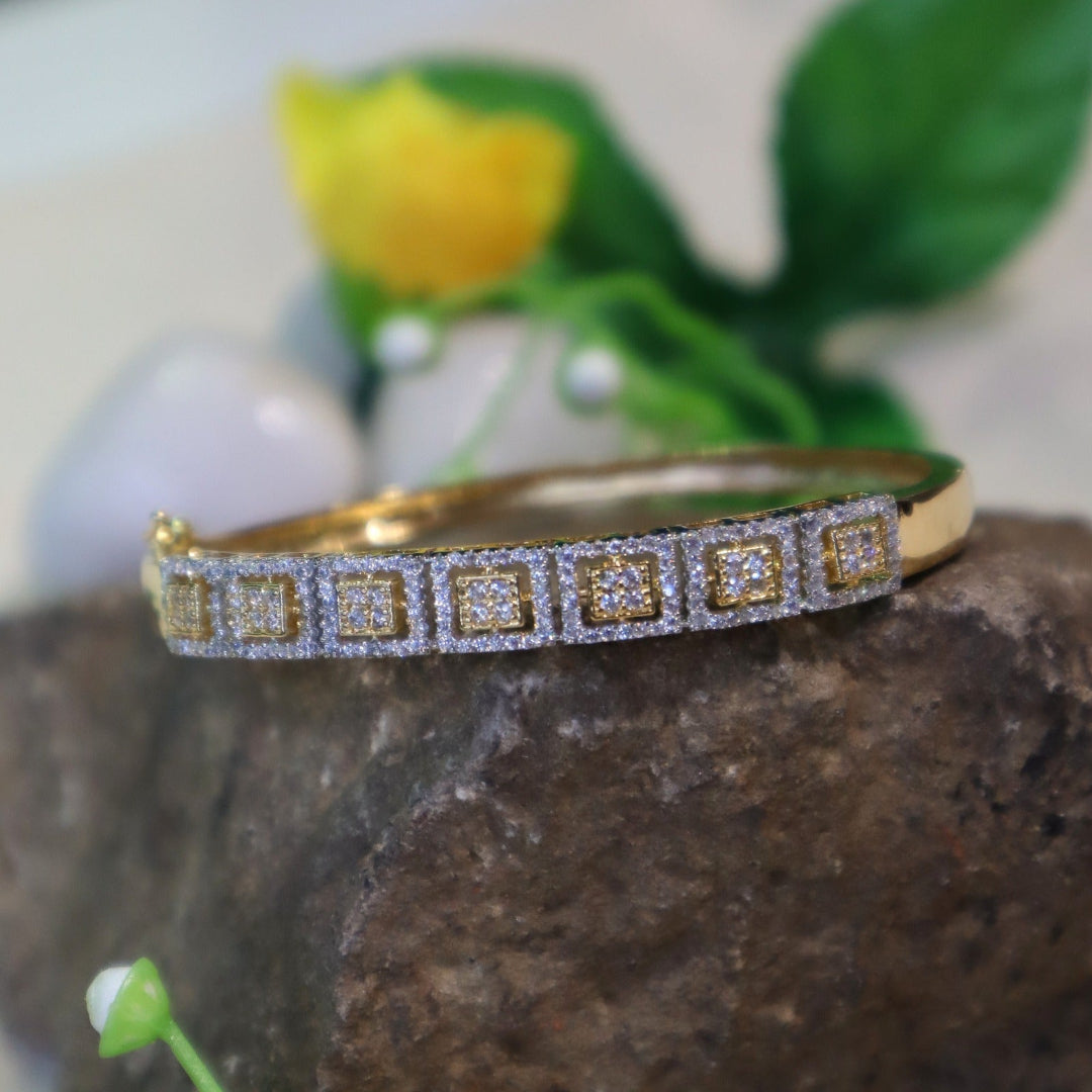 Gold bracelet with square diamond cluster design. - SIA450970
