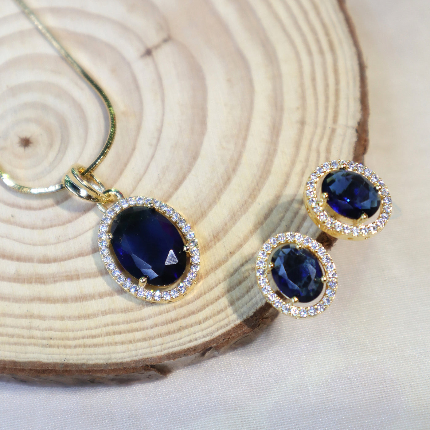 Oval Royal Blue Pendant Set with Diamond Halo and Matching Stud Earrings - SIA450697_A
