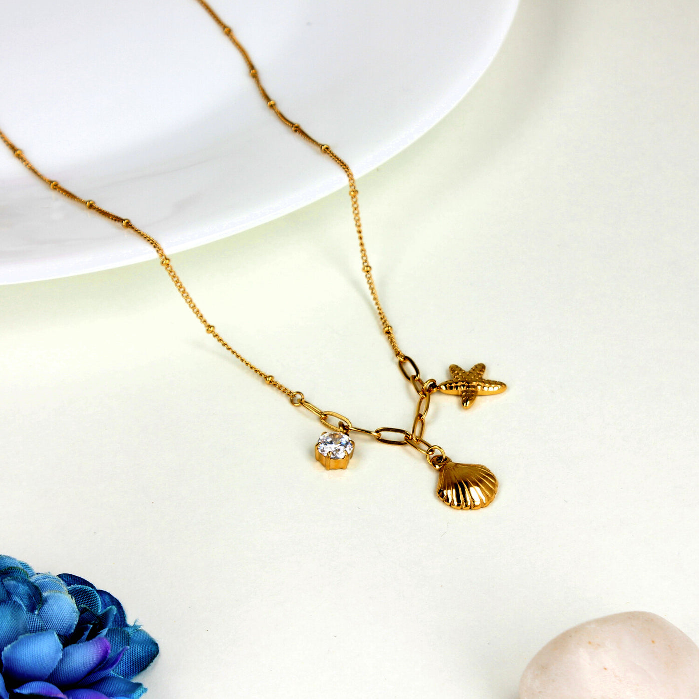 Delicate Gold Necklace with Starfish, Shell, and Crystal Charms - SIA449919