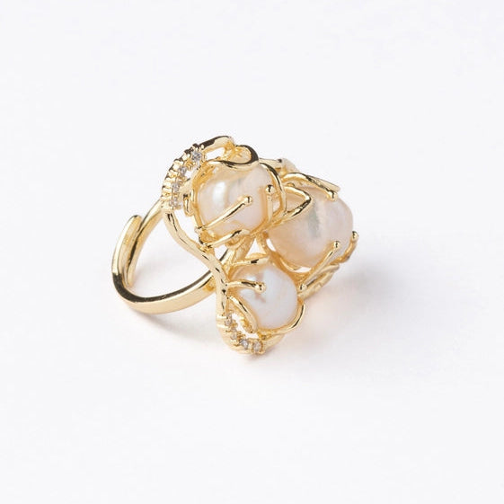 Elegant freshwater pearl ring, with abstract gold and cubic zirconia border. - TMV_RG8