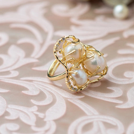 Elegant freshwater pearl ring, with abstract gold and cubic zirconia border. - TMV_RG8