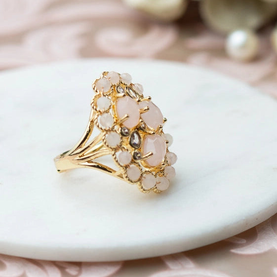 Baby pink stone ring with cubic zirconia in a pave setting. - TMV_RG6