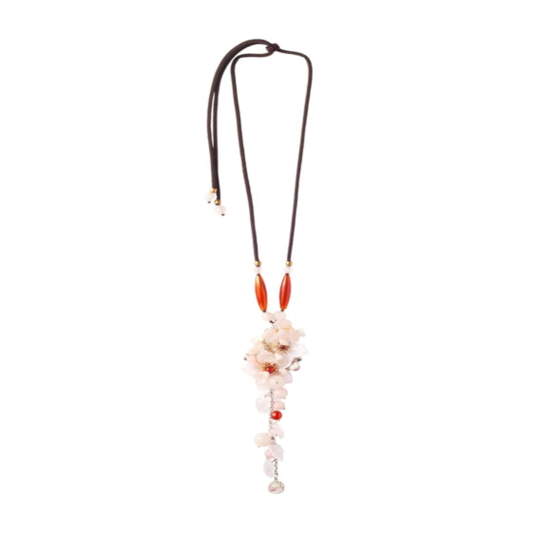 Rustic beads and a lovely pink flower on a brown thread. - TMV_NP6