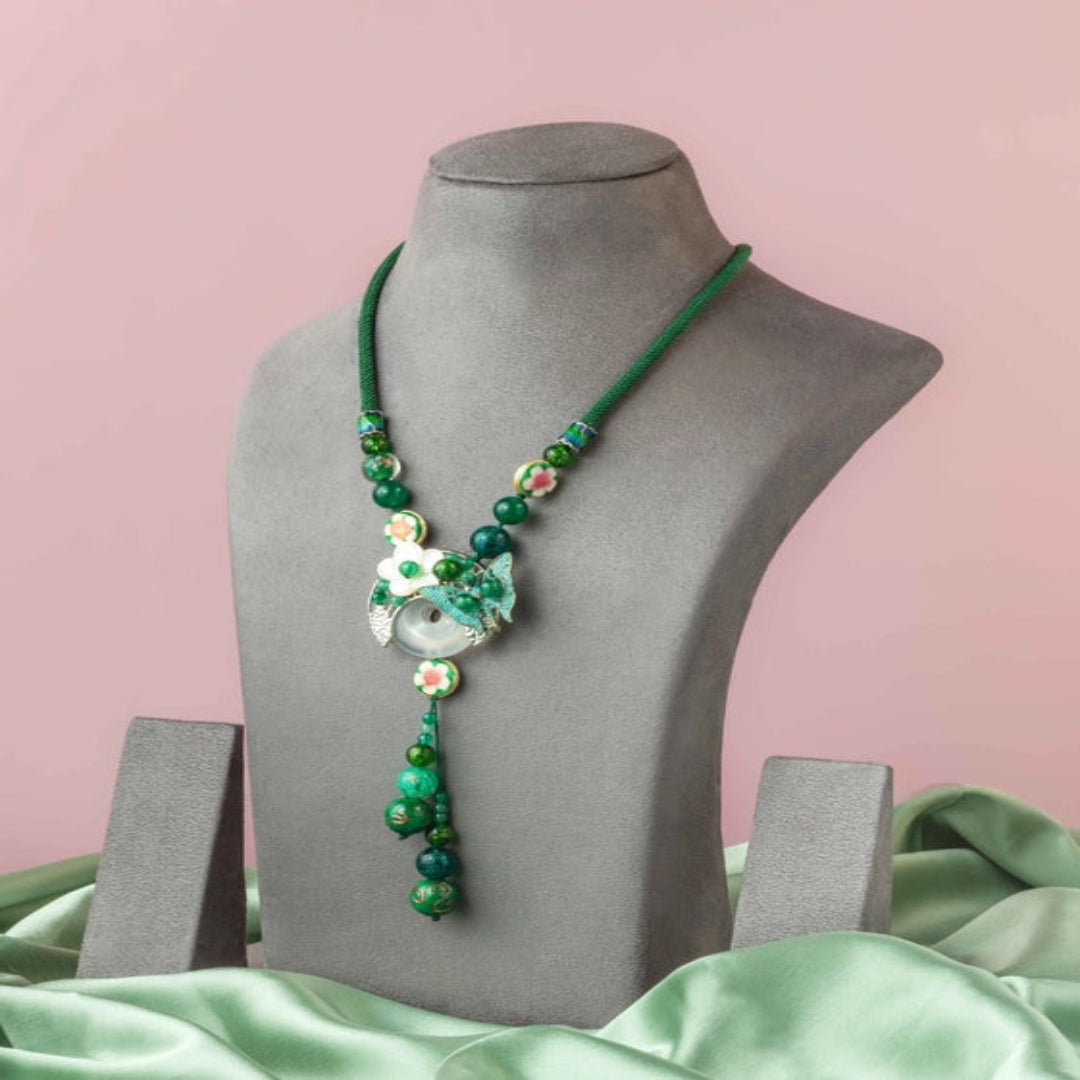 Refreshing green thread Neckpiece, with a charming butterfly and dangling embellishment. - TMV_NP5
