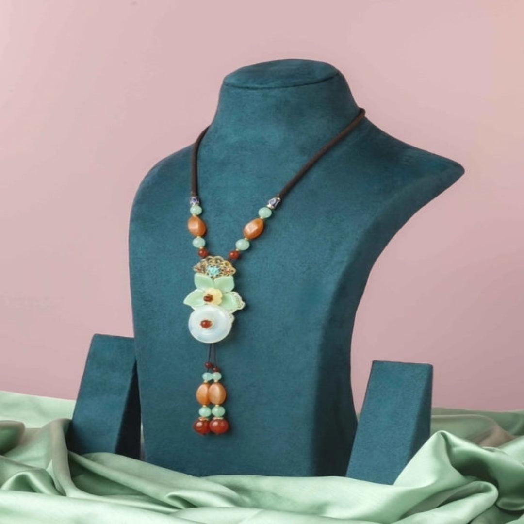 Unique brown thread Neckpiece, with a green flower and a hanging detail. - TMV_NP7