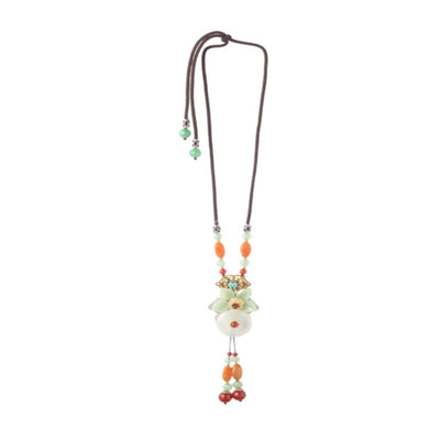 Unique brown thread Neckpiece, with a green flower and a hanging detail. - TMV_NP7