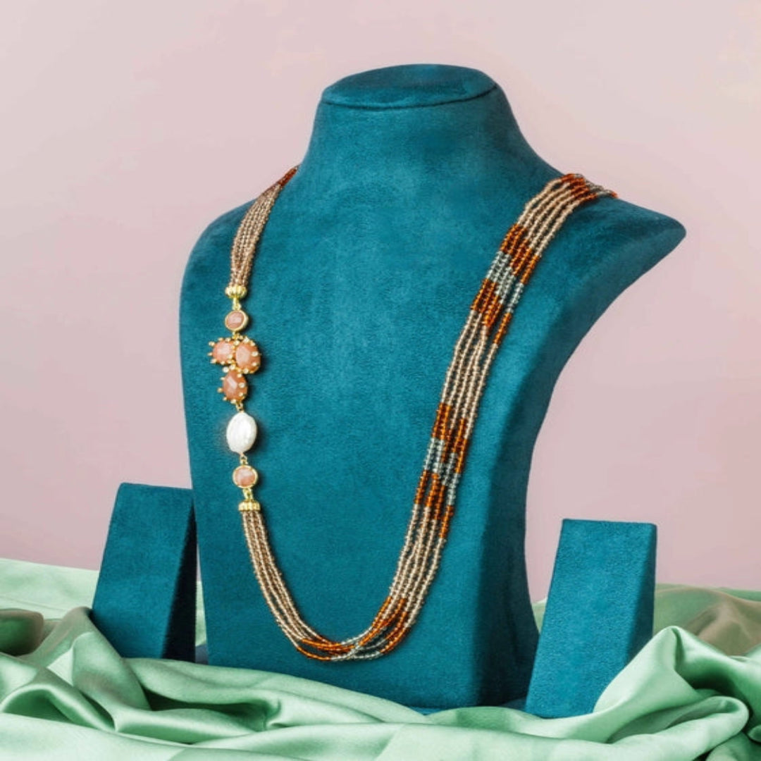 Rustic shades of rust, grey, and orange beads with an agate pendant. - TMV_NP23