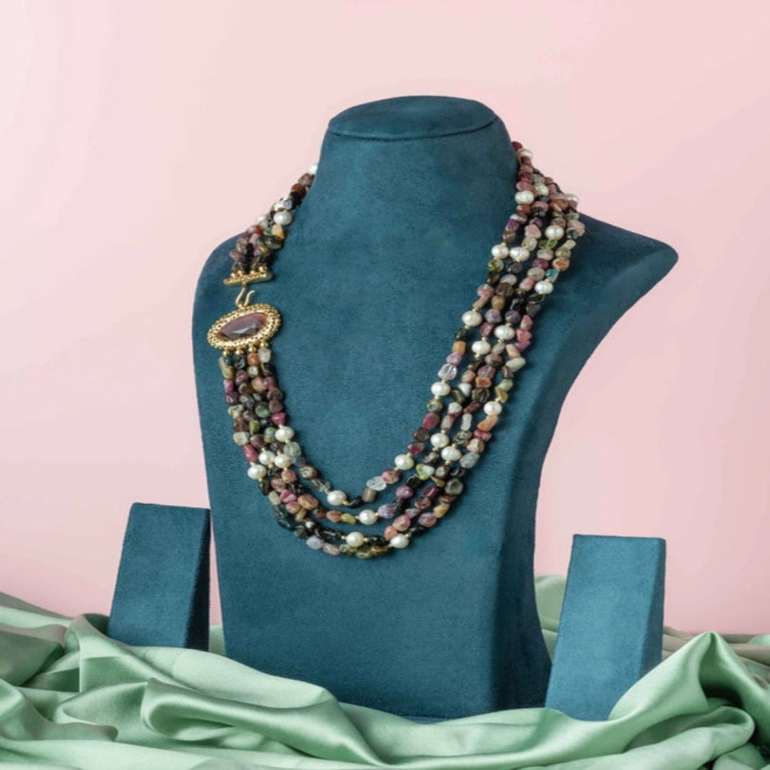 A beautiful four-string neckpiece with multi-colored beads and a pink shaded stone. - TMV_NP24