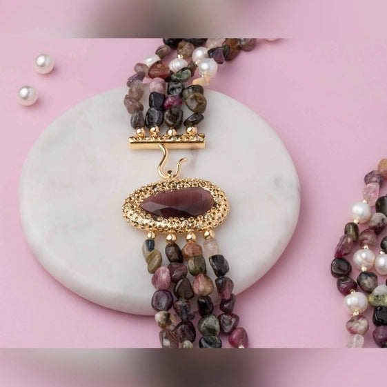 A beautiful four-string neckpiece with multi-colored beads and a pink shaded stone. - TMV_NP24