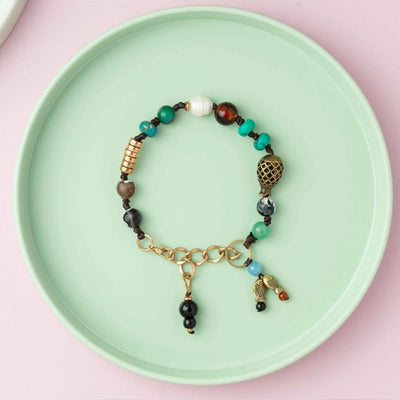 Threaded Multicolored Fish Bead Bracelet. - TMV_BRCT18