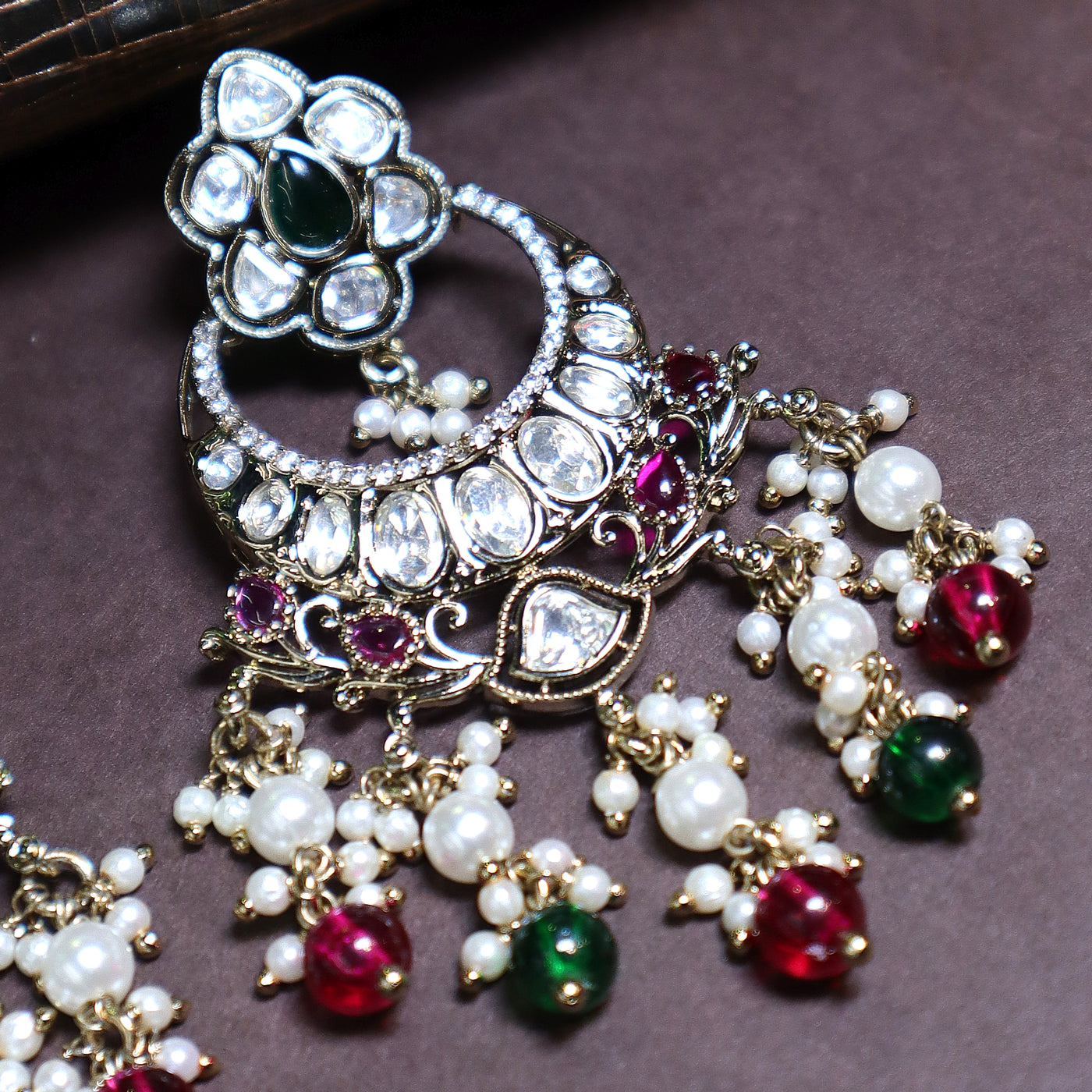 Kundan Earrings with Red and Green Beads - SIA448072