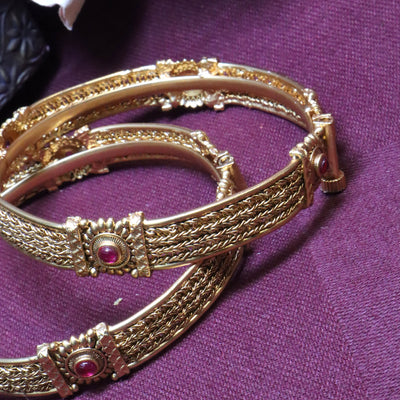 Traditional Gold Filigree Bangle Kada with Woven Texture and Ruby Accent - SIA454257