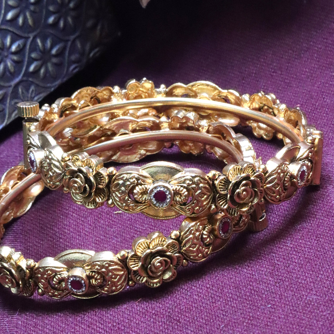 Gold-Toned Rose Design Bangles with Red Stone Accents - SIA454243
