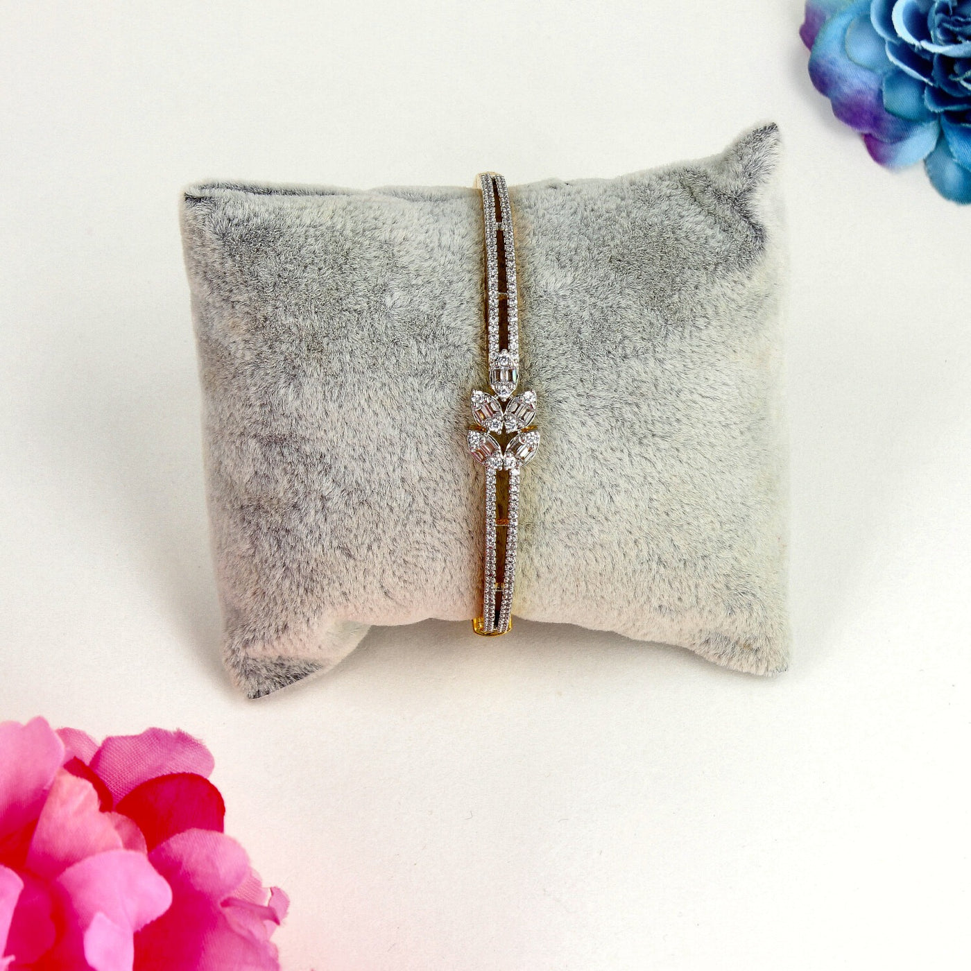 Gold and Silver Dual-Tone Bracelet with Central Floral Cluster and Baguette-Cut Crystal Accents - SIA443571