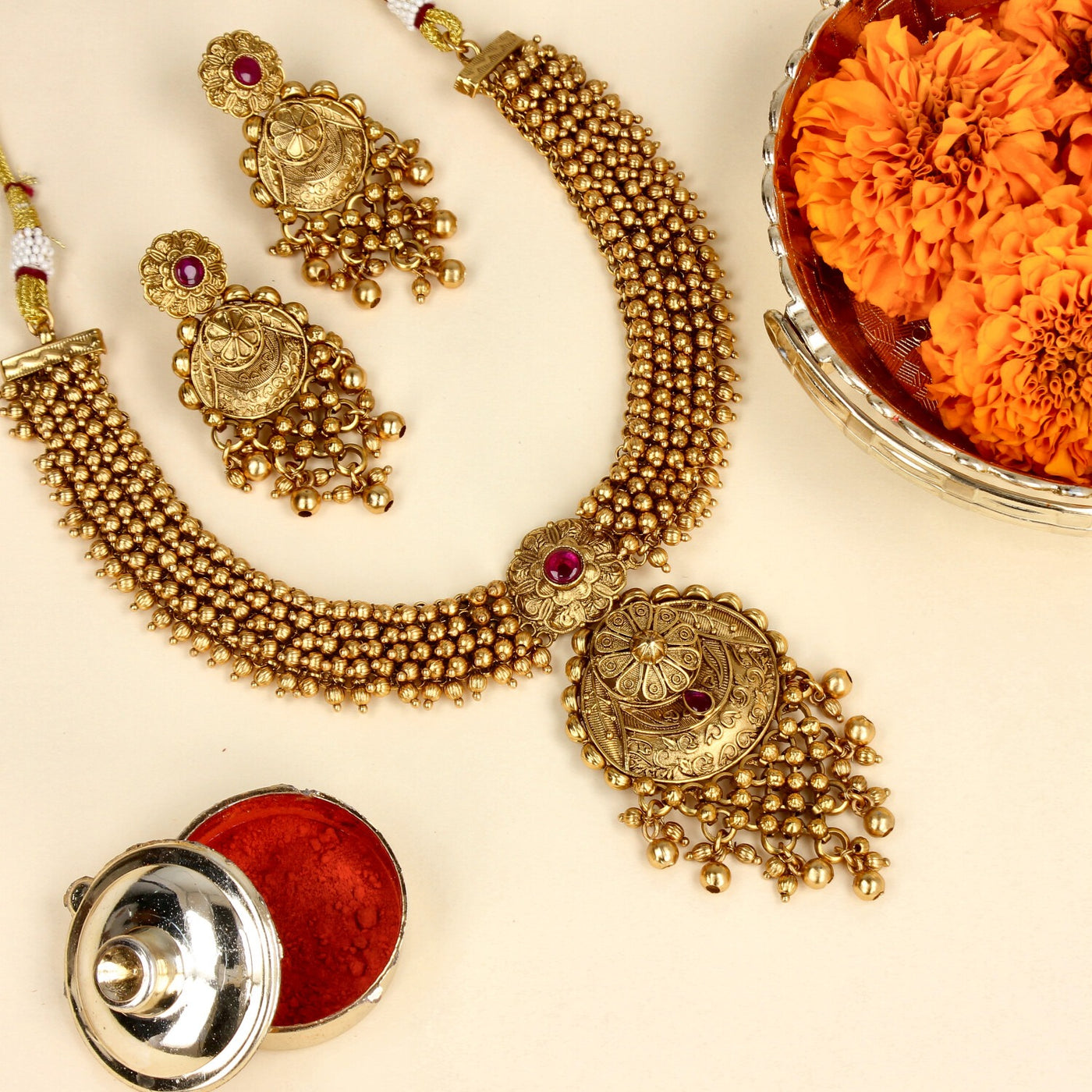 Temple-Inspired Matte Gold Necklace Set with Carved Round Motif - SIA447269