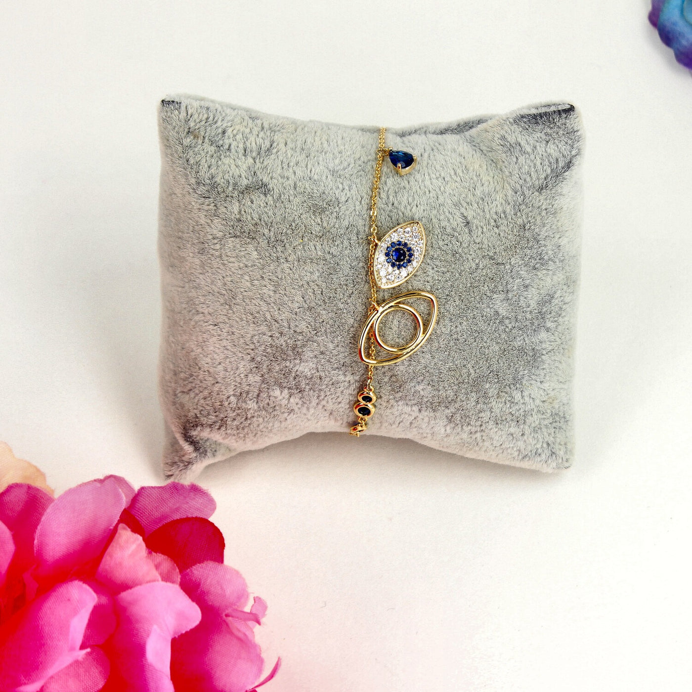 Gold evil eye bracelet with blue stones for stylish protection - SIA449633