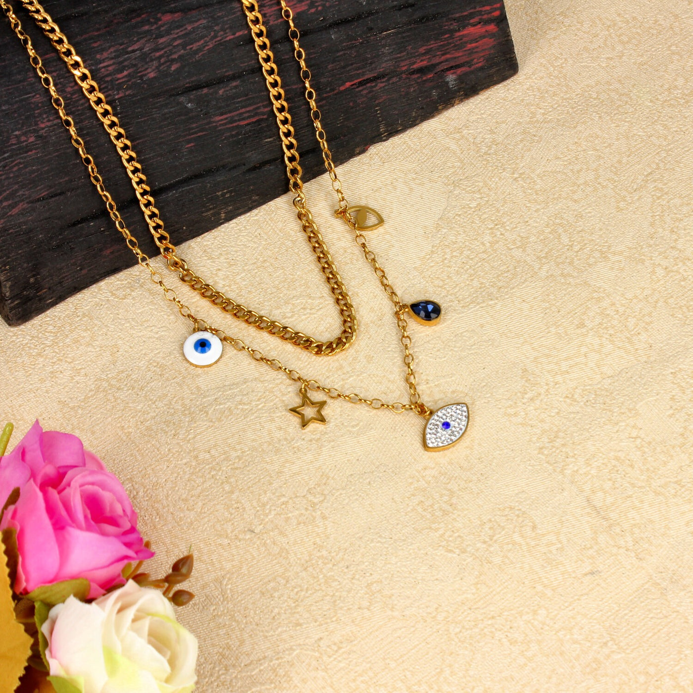 Layered Gold Charm Necklace with Evil Eye, Star, and Gem Pendants - SIA449922