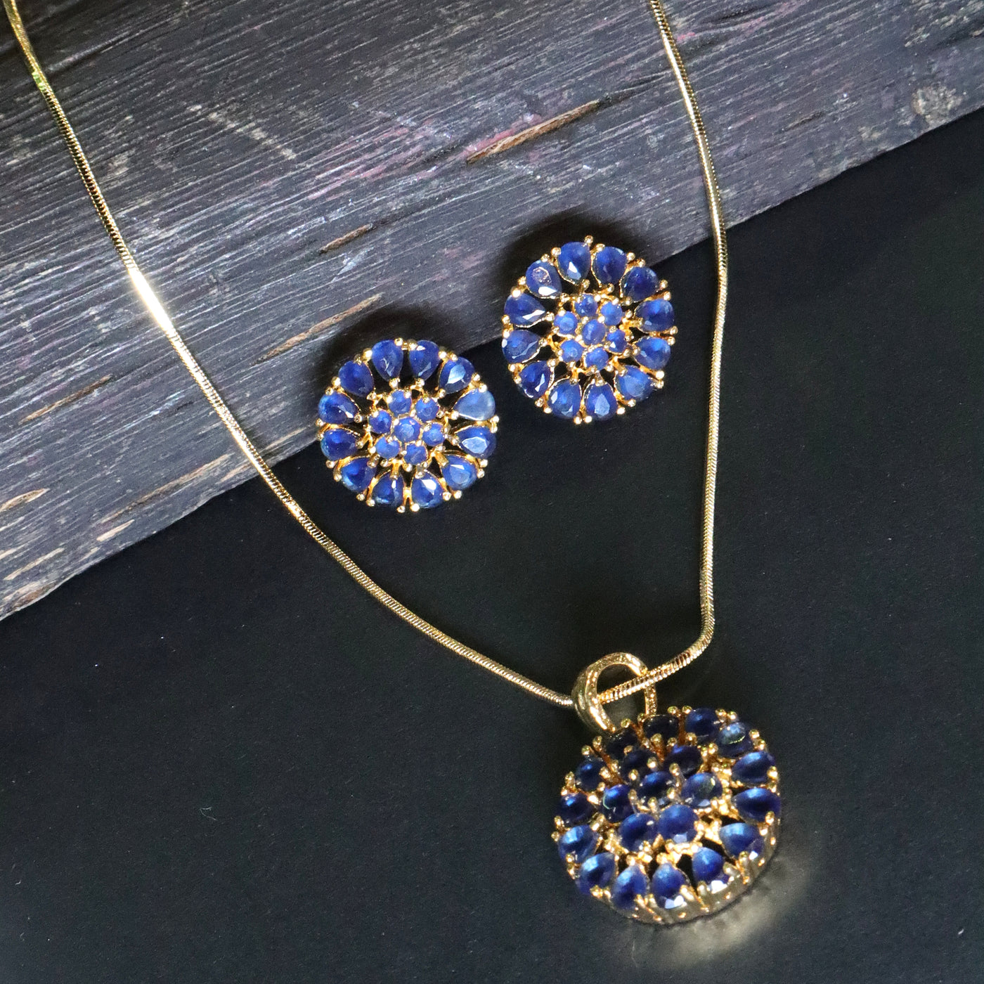 Gold-Toned Floral Pendant Set with Dark Blue Stones - SIA453080