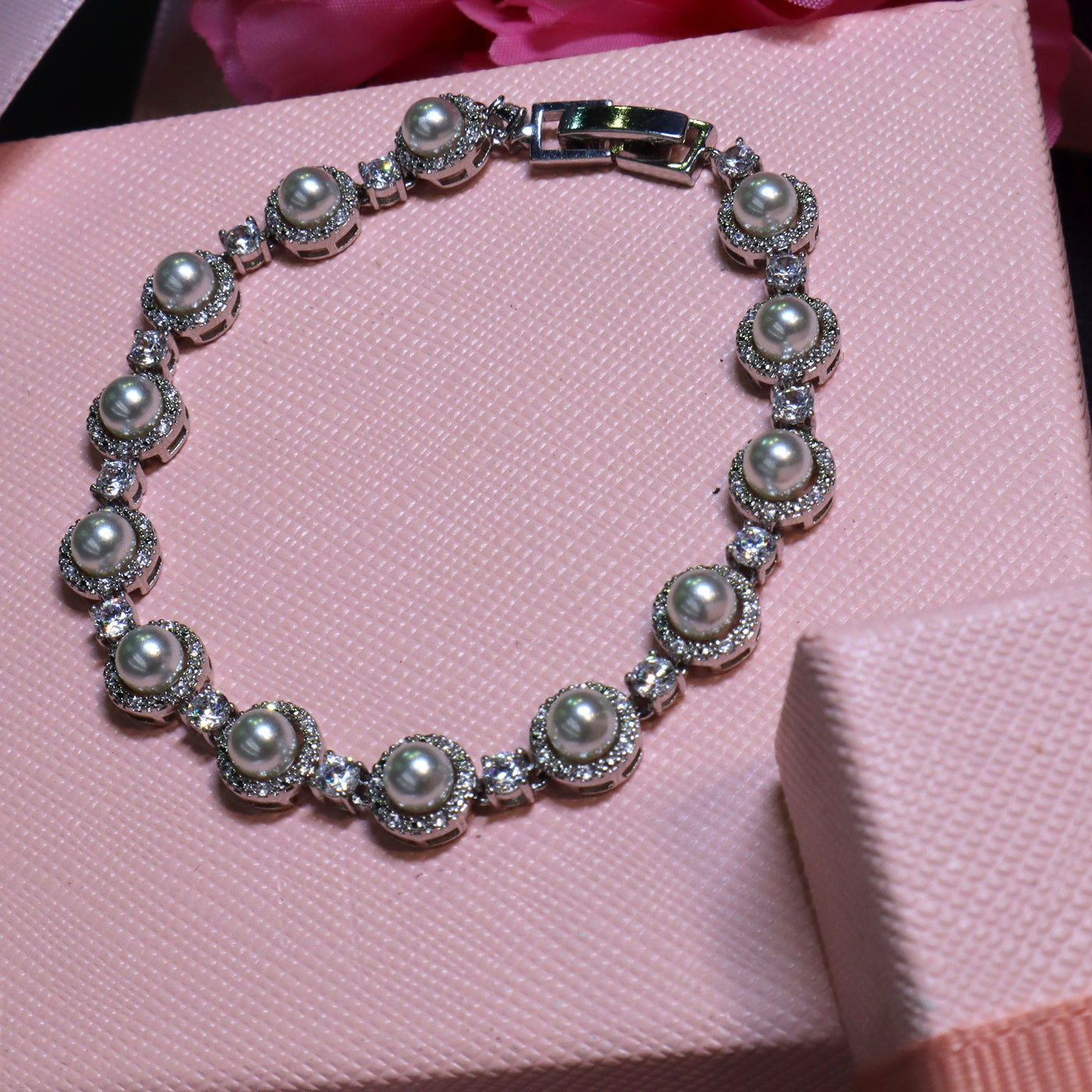 Rhodium Plated Pearl and Cubic Zirconia Halo Bracelet - SIA453388