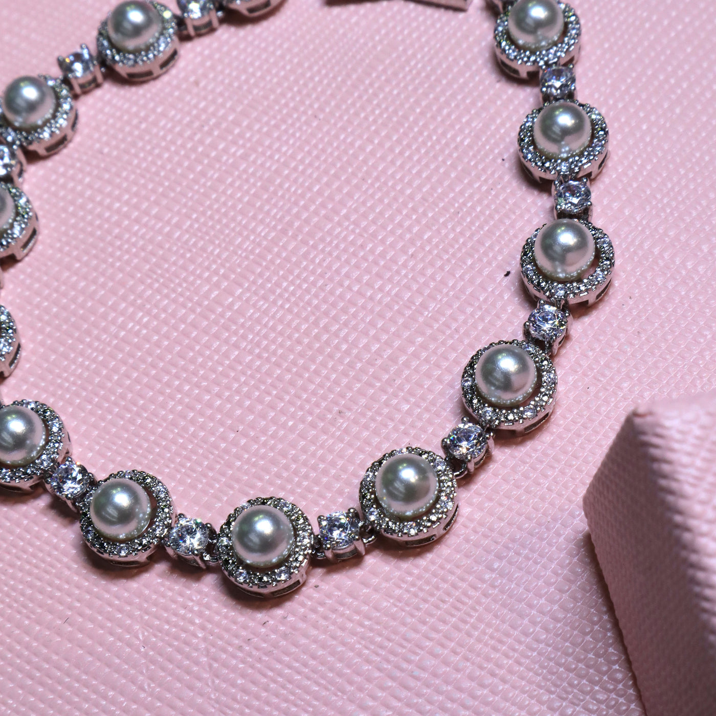 Rhodium Plated Pearl and Cubic Zirconia Halo Bracelet - SIA453388