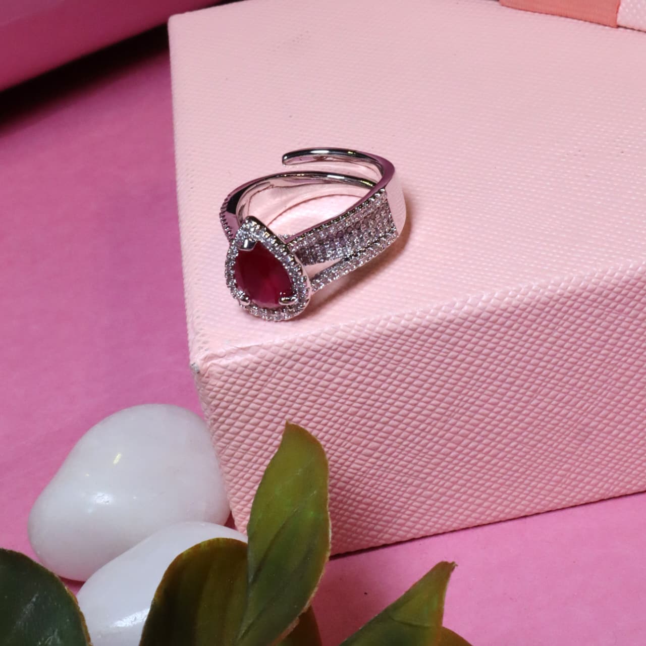 Luxurious Adjustable Ring with Pear-Cut Red Gemstone, Halo, and Pave Shoulders - SIA455466