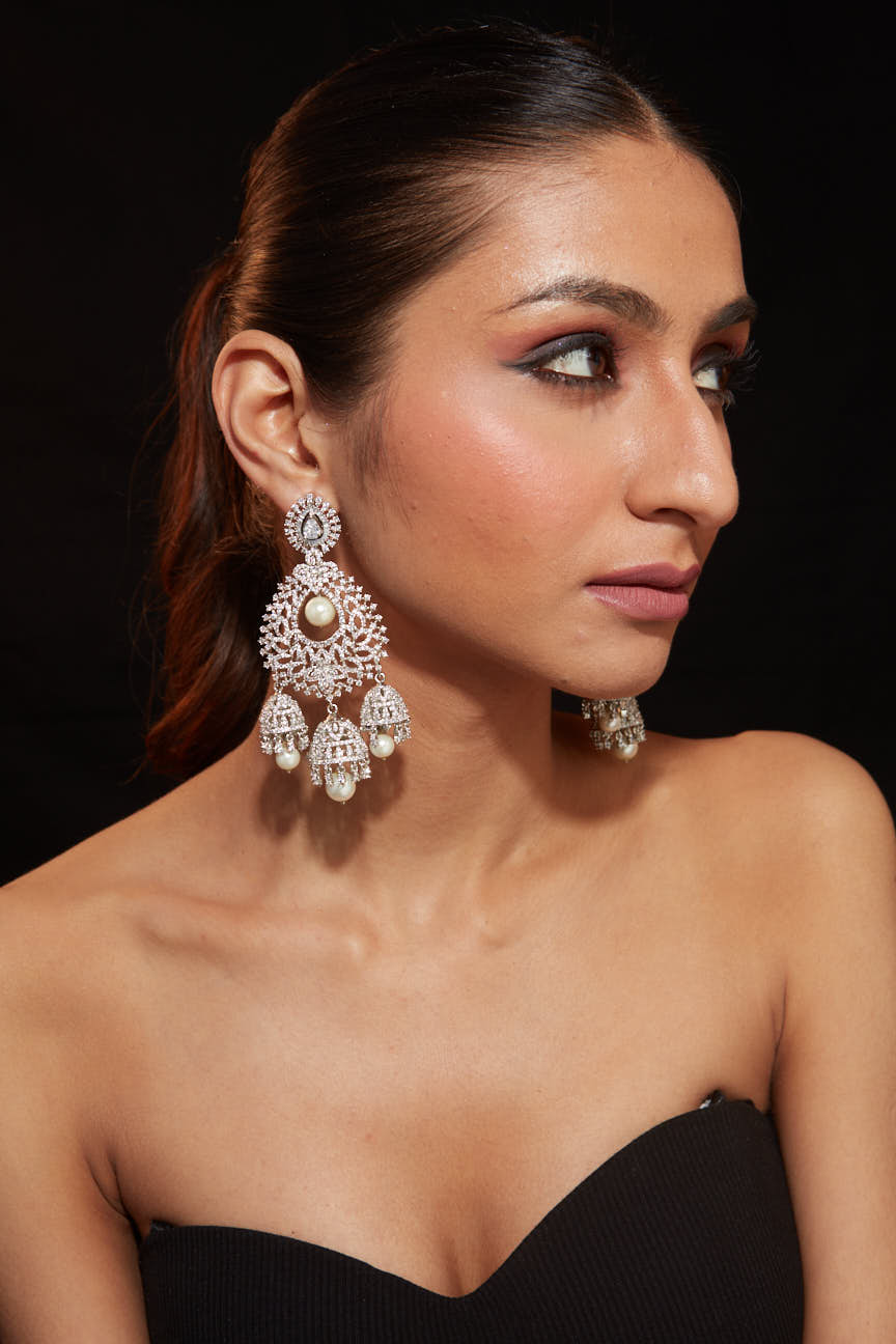 Rhodium Plated Zircon Studded With Pearl Drop Jhumka Dangle Earrings - VE339