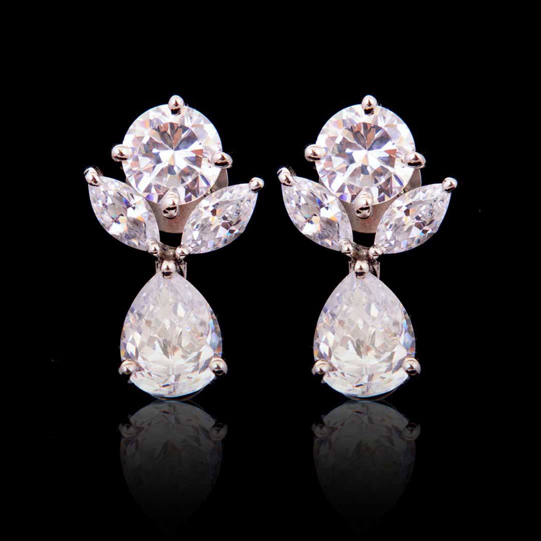 92.5 Silver Petal And Solitaire Diamond Earrings By Treszuri L1427